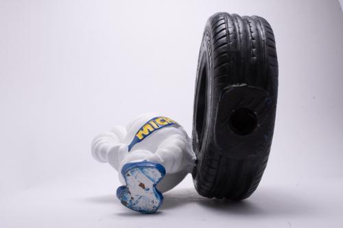 ‘Bibendum with a wheel’, the Michelin man, mid 20th century.