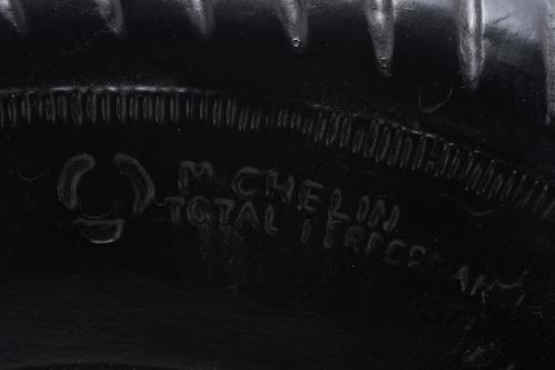 ‘Bibendum with a wheel’, the Michelin man, mid 20th century.
