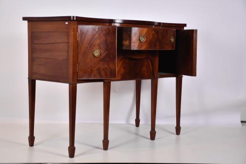 Hepplewhite-style sideboard.