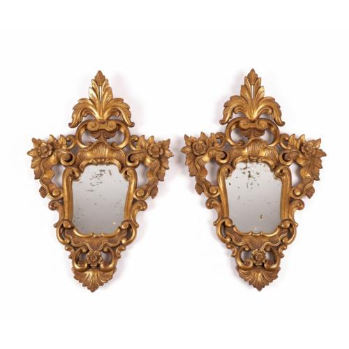 Pair of Elizabethan ornamental mirrors, 19th century.