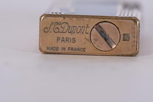 Lote de cuatro encendedores.