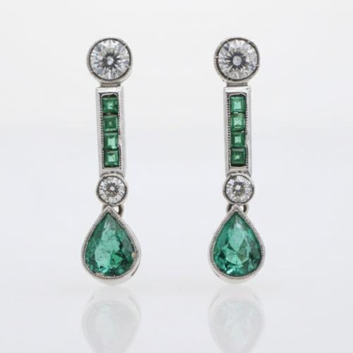 Emeralds and diamonds earrings.
