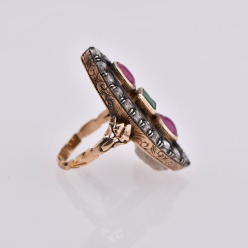 Ring with emeralds, rubies and diamonds, early 20th century.