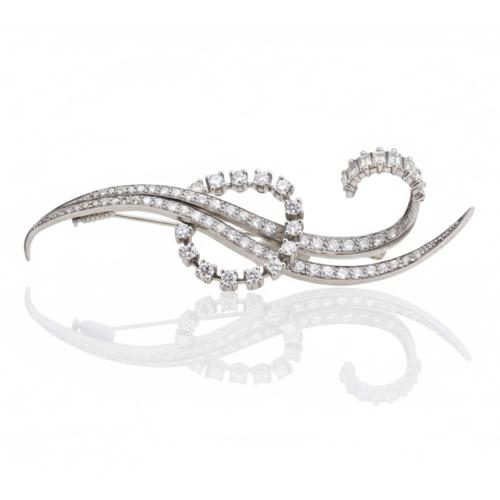 Bow-shaped brooch with diamonds, 1960's.