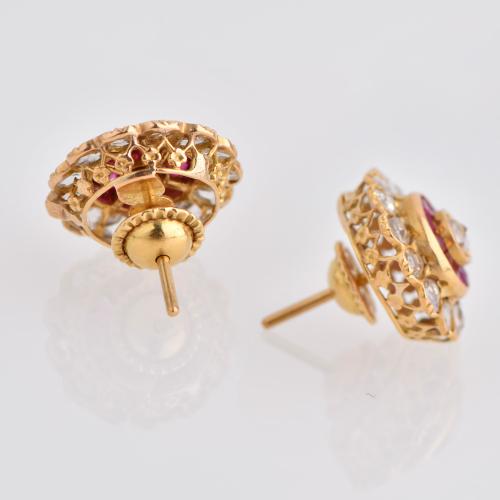 Pendientes estilo art déco con diamantes y rubíes.
