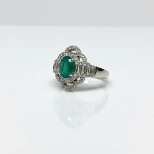 Emerald and diamonds ring.