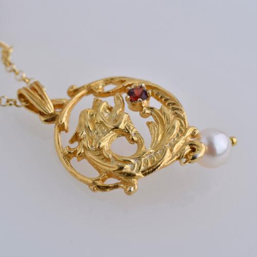 Modernist-style pendant with chain, with rodolite garnet an