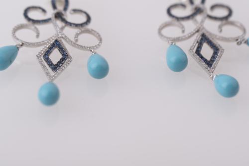 Girandole earrings.