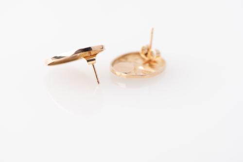 Abstract style earrings.