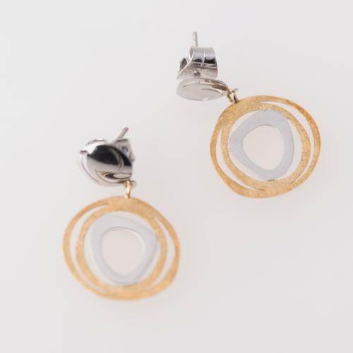 Earrings with organic shapes.
