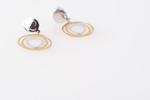 Earrings with organic shapes.