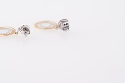 Earrings with organic shapes.