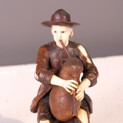 AFTER 17TH-CENTURY GERMAN MODELS, pair of musicians, 19th c
