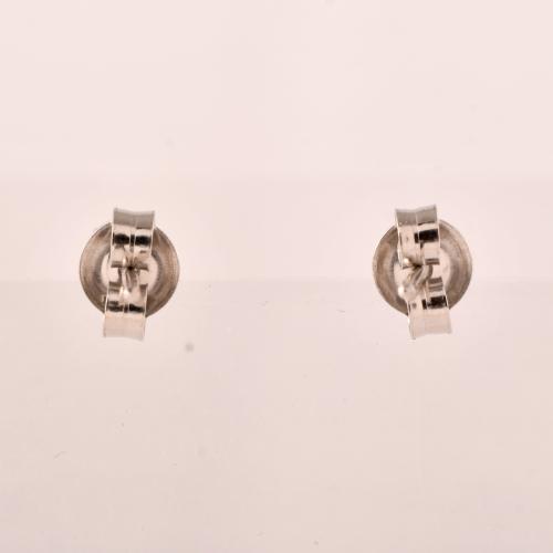 Pendientes con esmeralda y rosetón de diamantes.