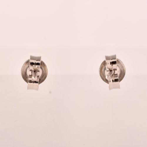 Pendientes con esmeralda y rosetón de diamantes.