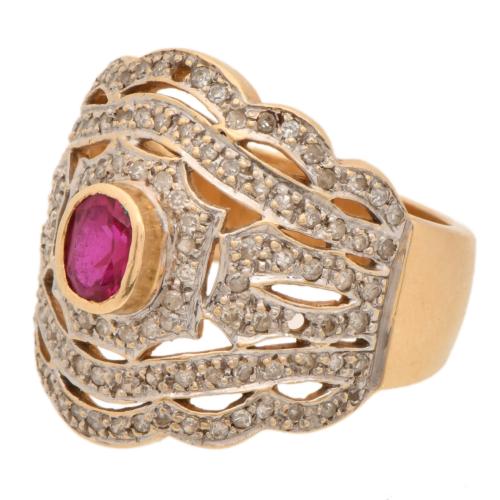 Anillo estilo art déco con rubí central y diamantes.
