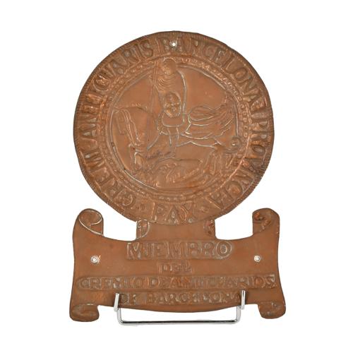 Placa del gremio de anticuarios de Barcelona