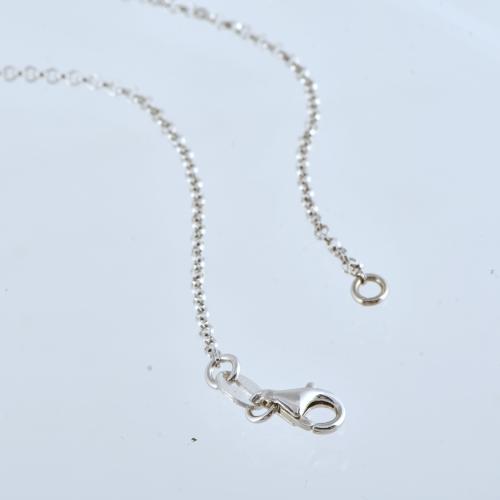 Conjunto de collar y pulsera con circonitas.