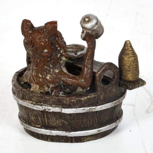 AFTER MODELS BY FRANZ BERGMAN, fox figure in a bathtub, 19t