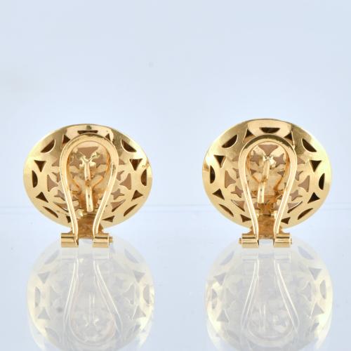 Pendientes con perla mabé.