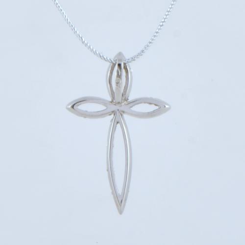 Colgante en forma de cruz con diamantes.