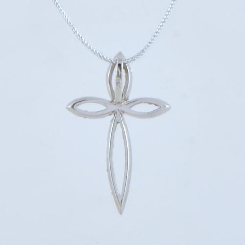 Colgante en forma de cruz con diamantes.