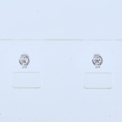 Pendientes con rubíes y rosetón de diamantes.