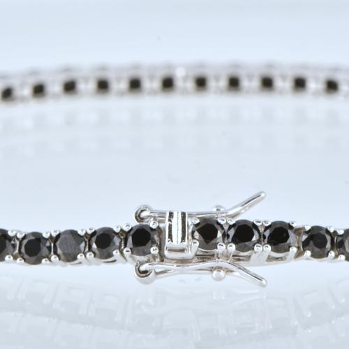 Pulsera riviére con circonitas negras.