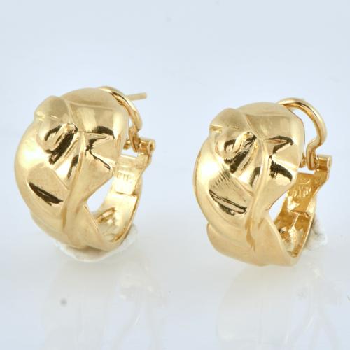 Dos parejas de pendientes anchos con circonitas.