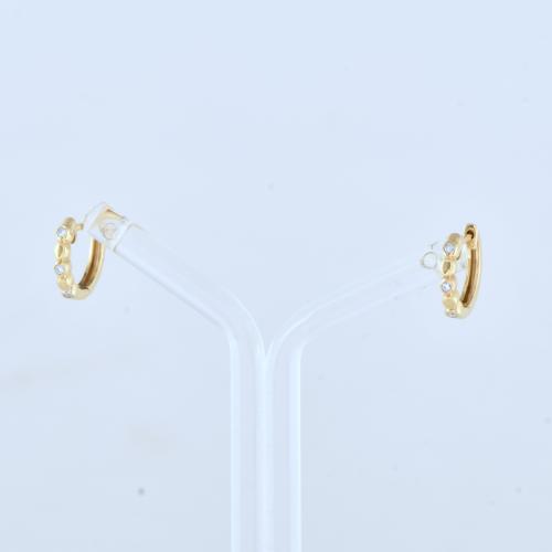 Pendientes aretes con diamantes.