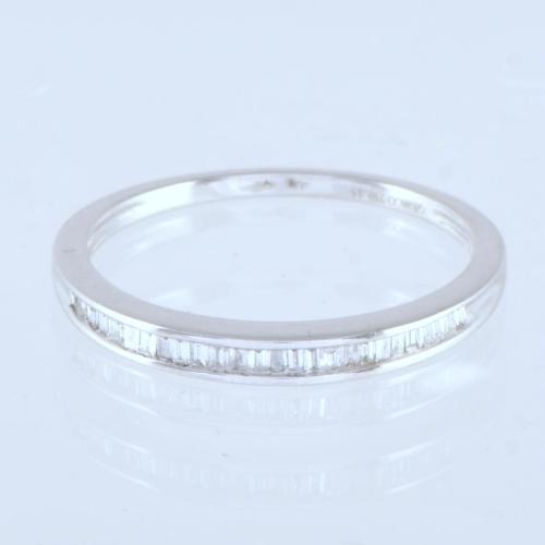 Half-band diamonds wedding ring.