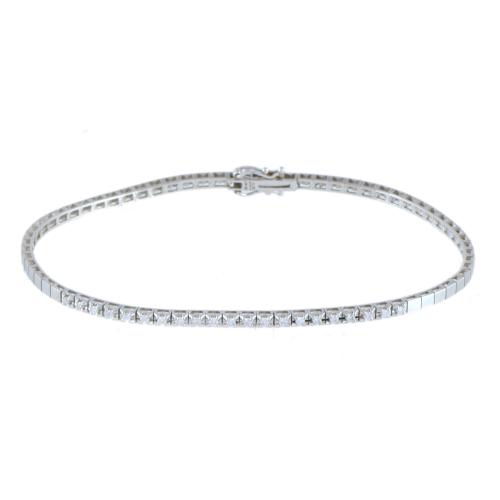 Pulsera tipo media-riviére semi-rígida con diamantes.