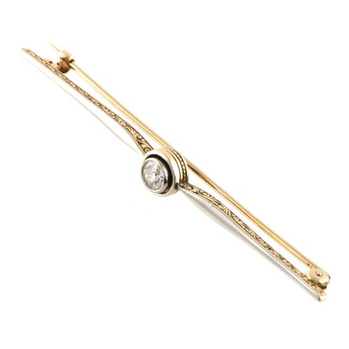 Broche estilo art déco con diamante.