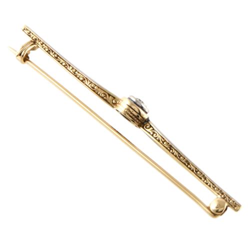 Broche estilo art déco con diamante.