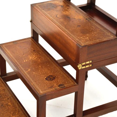 Library ladder convertible into a side table.