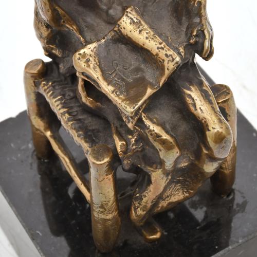 AFTER DALÍ'S MODELS. ‘Don Quixote seated’.