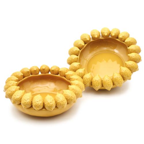 AFTER MODELS BY BORDALLO PINHEIRO. Pair of centrepieces.