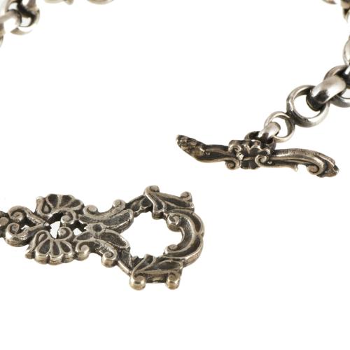 Pulsera mallorquina con colgante de la cruz de malta.