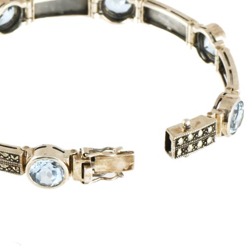 Pulsera articulada con topacios naturales y marquesitas.