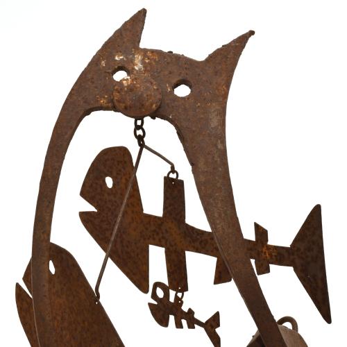 Italian mobile figure of a cat and fish.