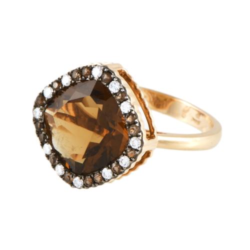 Sortija con topacio central y diamantes.