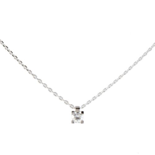 Necklace with a single diamond pendant.