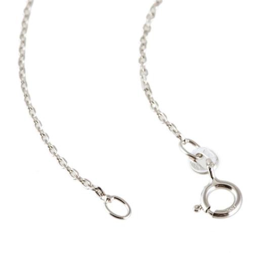 Necklace with a single diamond pendant.