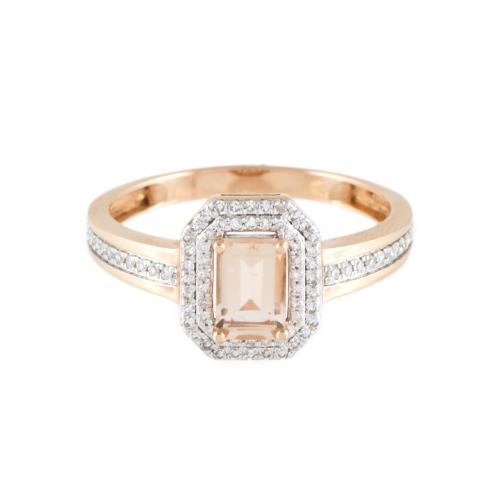 Anillo con topacio central y diamantes.