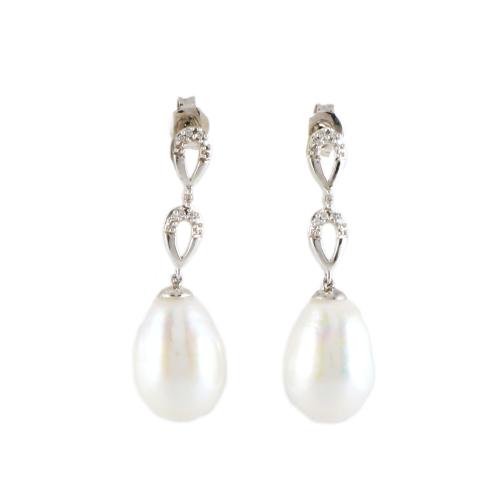 Pendientes largos con diamantes y perla barroca.