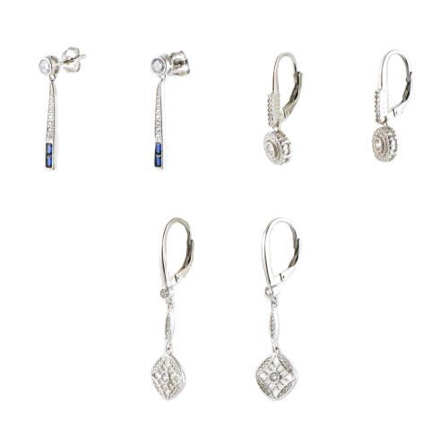 Lote de tres pares de pendientes con circonitas.