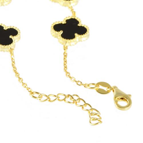 Colgante y pulsera con tréboles en ónix.