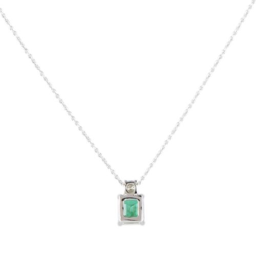 Necklace with emerald and diamond pendant.