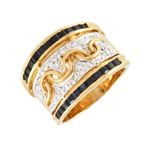 Anillo ancho con zafiros y diamantes.