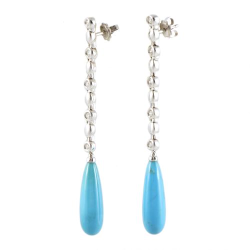 Pendientes largos con turquesas y diamantes.